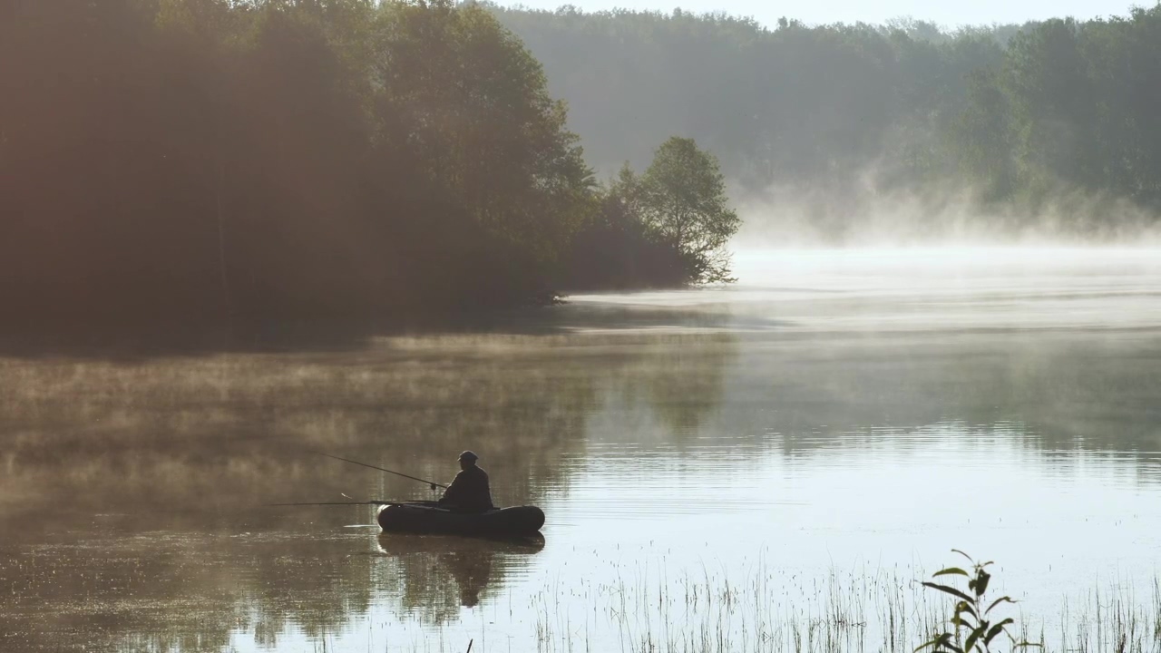 A person fishing on a boat on a misty early morning, nature, lake, boat, mist, outdoors, fish, fog, alone, and bass fishing