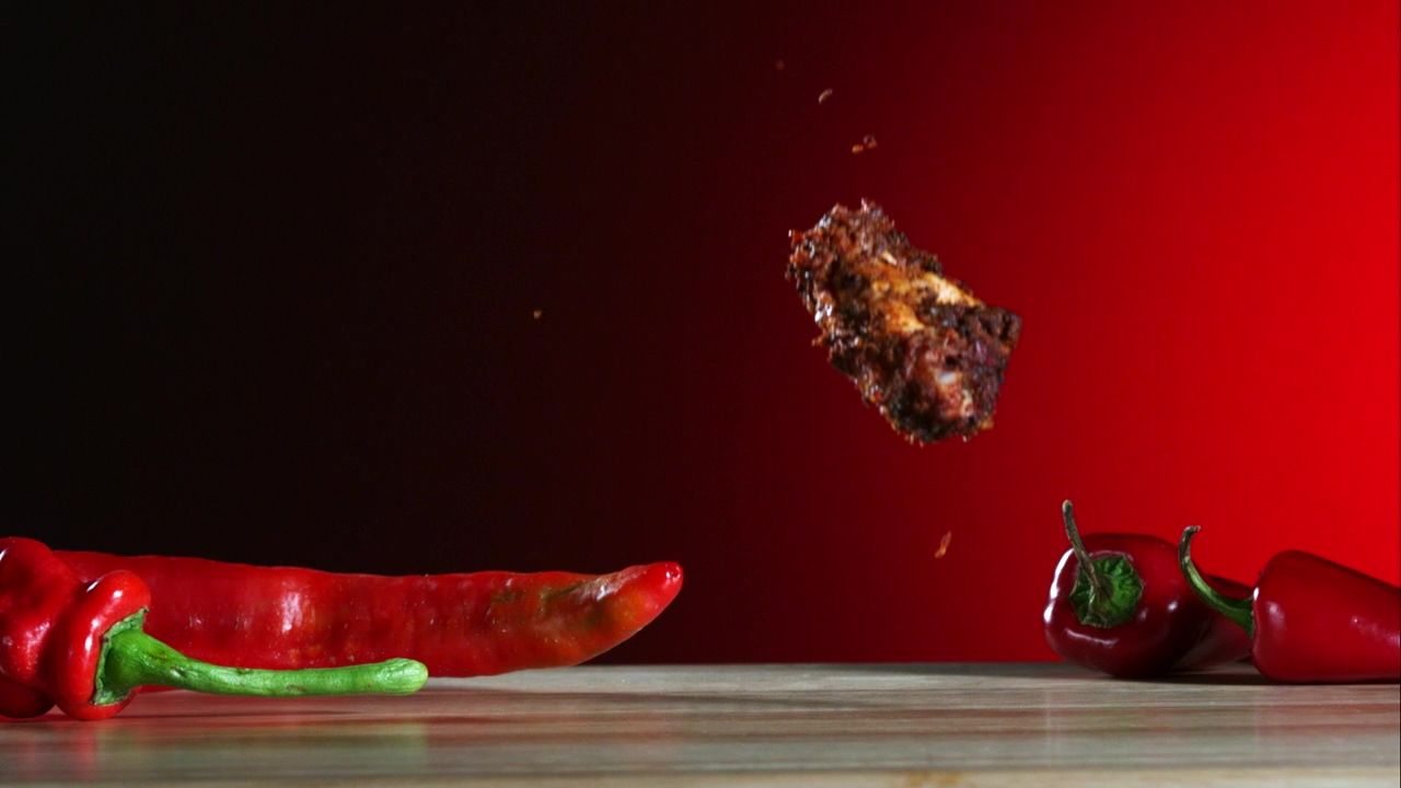 Barbecue chicken wings falling in slow motion, food, fast food, meat, advertising, chicken, falling, and barbecue