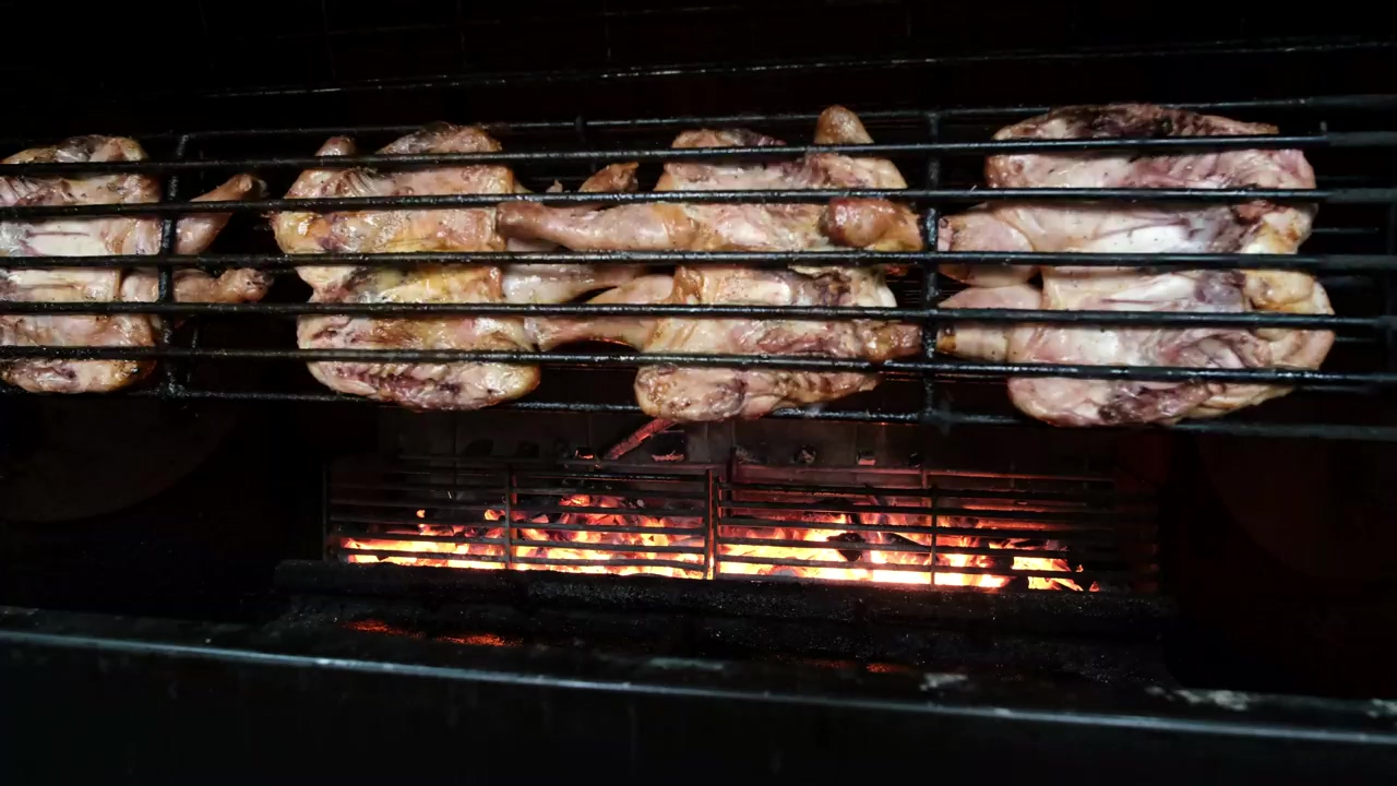 Chicken roasted in a barbecue oven, cook, grill, chicken, barbecue, and spit roast
