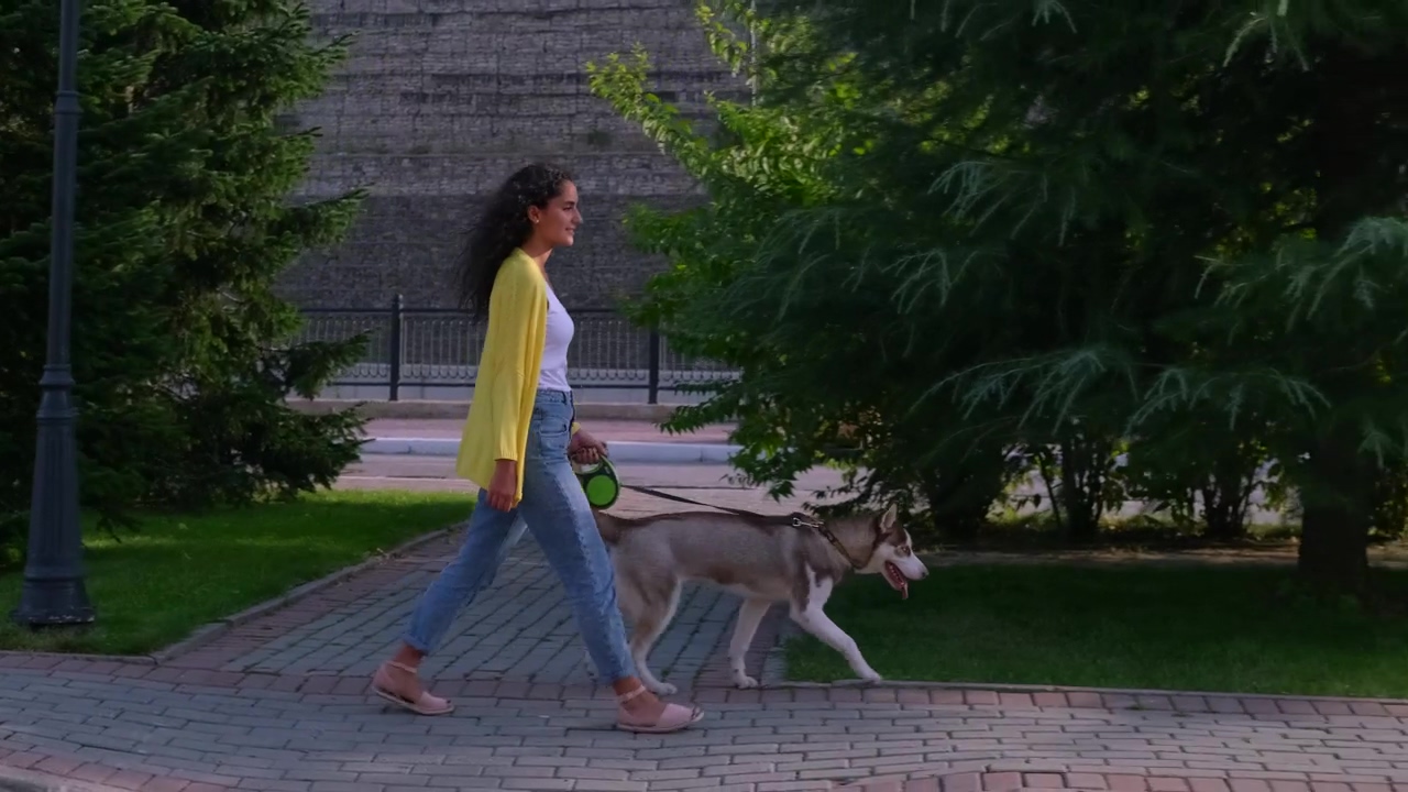 Girl walking her husky dog through the park, girl, walking, dog, pet, friend, young, and husky