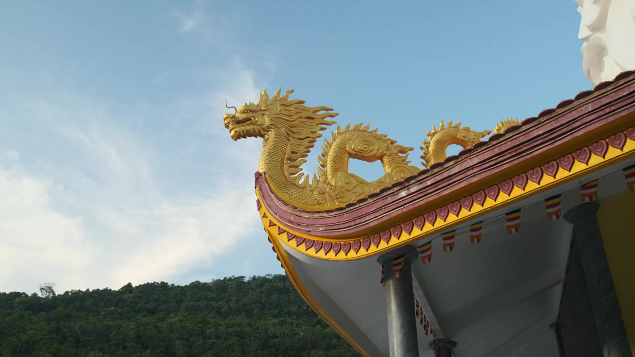Golden dragon at the exterior of the ho quoc pagoda vietnam, gold, temple, rooftop, vietnam, sculpture, and dragon