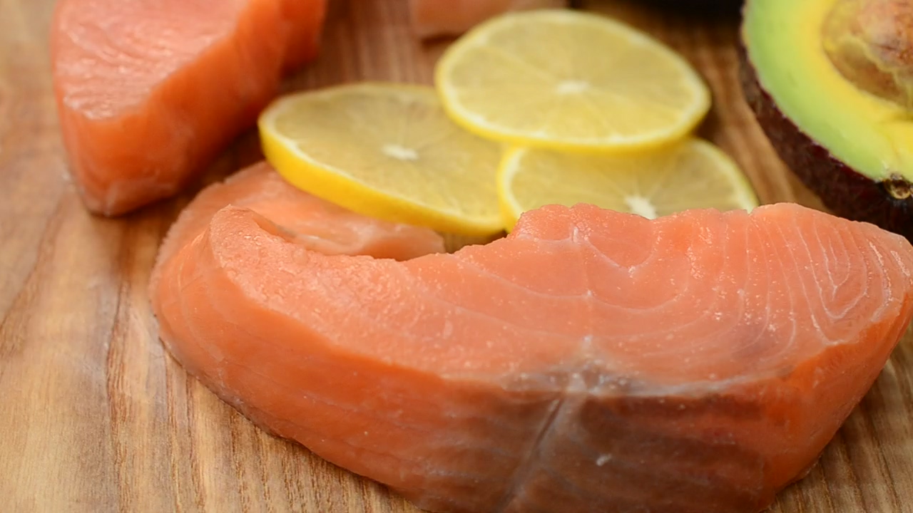 Salmon chunks with lemon, food preparation, fish, and lemon
