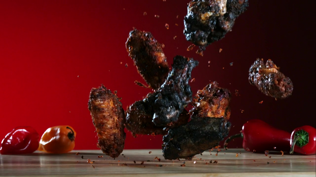Smoked chicken wings falling in slow motion, food, fast food, meat, chicken, and falling