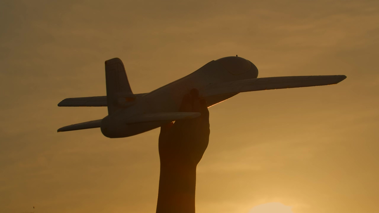 Toy plane being thrown through the air at sunset #sunset #planes #plane #fly #aeroplane #wings