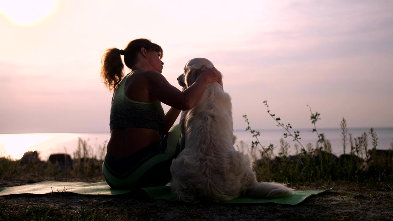 Woman relaxing with her dog, dog, pet, and relax